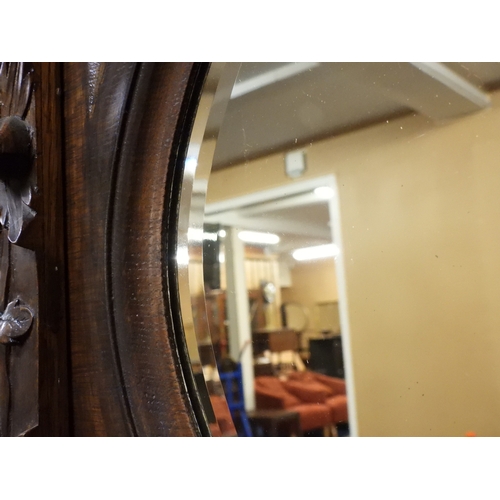 2028 - A LARGE LATE 19TH CENTURY CONTINENTAL OAK MIRROR BACK SIDEBOARDwith moulded projecting cornice on ca... 