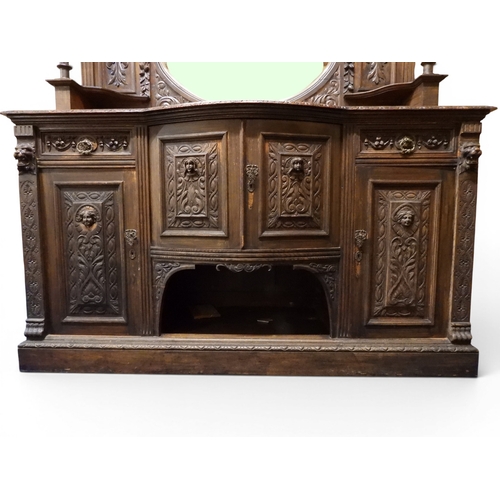 2028 - A LARGE LATE 19TH CENTURY CONTINENTAL OAK MIRROR BACK SIDEBOARDwith moulded projecting cornice on ca... 