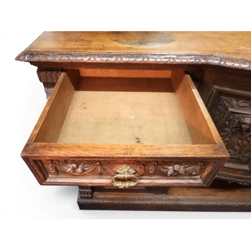2028 - A LARGE LATE 19TH CENTURY CONTINENTAL OAK MIRROR BACK SIDEBOARDwith moulded projecting cornice on ca... 