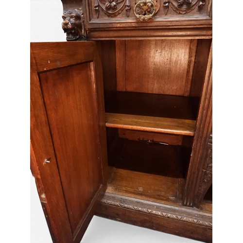2028 - A LARGE LATE 19TH CENTURY CONTINENTAL OAK MIRROR BACK SIDEBOARDwith moulded projecting cornice on ca... 