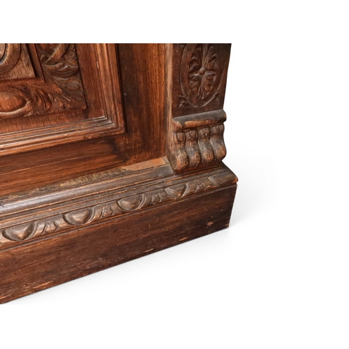 2028 - A LARGE LATE 19TH CENTURY CONTINENTAL OAK MIRROR BACK SIDEBOARDwith moulded projecting cornice on ca... 