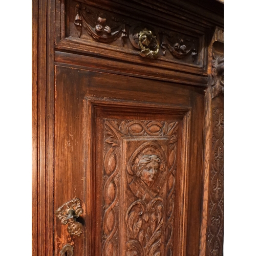 2028 - A LARGE LATE 19TH CENTURY CONTINENTAL OAK MIRROR BACK SIDEBOARDwith moulded projecting cornice on ca... 