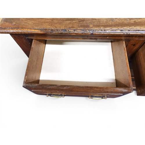 2035 - AN 18TH CENTURY OAK KITCHEN DRESSER BASEwith three plank top over three short drawers and panel cabi... 