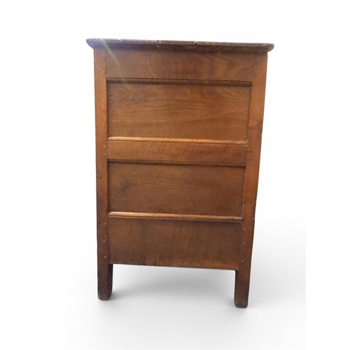 2035 - AN 18TH CENTURY OAK KITCHEN DRESSER BASEwith three plank top over three short drawers and panel cabi... 