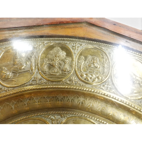 2053 - A LARGE ARABESQUE STYLE OCTAGONAL CENTRE TABLEwith central circular brass tray embossed with reclini... 