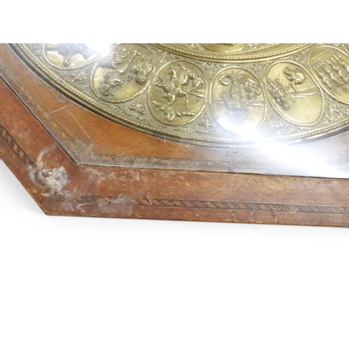 2053 - A LARGE ARABESQUE STYLE OCTAGONAL CENTRE TABLEwith central circular brass tray embossed with reclini... 
