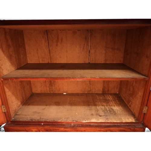 2055 - A LARGE VICTORIAN MAHOGANY BREAKFRONT LIBRARY BOOKCASEwith moulded cornice over four glazed doors on... 