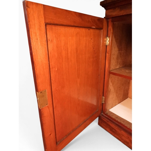 2055 - A LARGE VICTORIAN MAHOGANY BREAKFRONT LIBRARY BOOKCASEwith moulded cornice over four glazed doors on... 