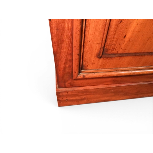 2055 - A LARGE VICTORIAN MAHOGANY BREAKFRONT LIBRARY BOOKCASEwith moulded cornice over four glazed doors on... 