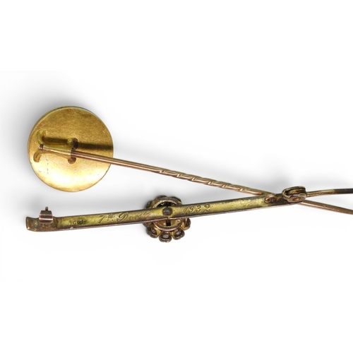 2753 - A CURIOUS TAXIDERMIED DOGS NOSE LAPEL PINmounted in bright yellow metal, diameter approx 17.8mm, wei... 