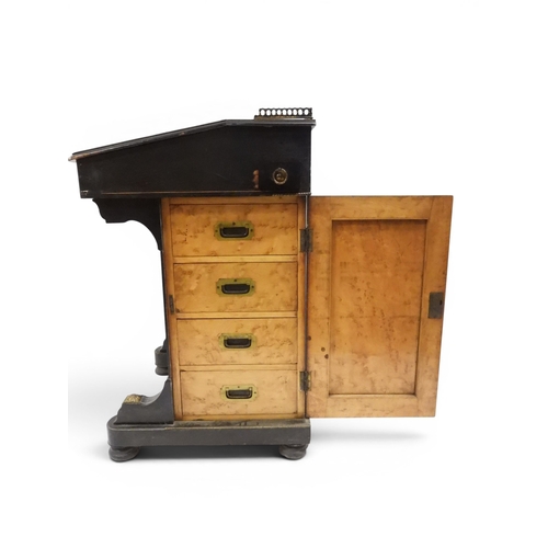 2002 - A VICTORIAN EBONISED AESTHETIC MOVEMENT DAVENPORT WRITING DESK with pierced brass gallery top over h... 
