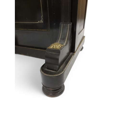 2002 - A VICTORIAN EBONISED AESTHETIC MOVEMENT DAVENPORT WRITING DESK with pierced brass gallery top over h... 