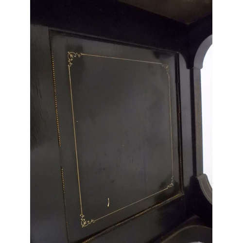 2002 - A VICTORIAN EBONISED AESTHETIC MOVEMENT DAVENPORT WRITING DESK with pierced brass gallery top over h... 