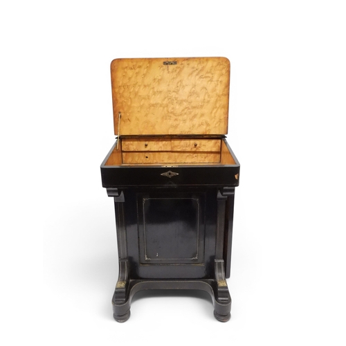 2002 - A VICTORIAN EBONISED AESTHETIC MOVEMENT DAVENPORT WRITING DESK with pierced brass gallery top over h... 