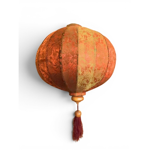 2004 - A LATE 19TH CENTURY MOROCCAN STYLE OCTAGONAL COPPER AND STAINED GLASS CANDLE LANTERNwith rise and fa... 
