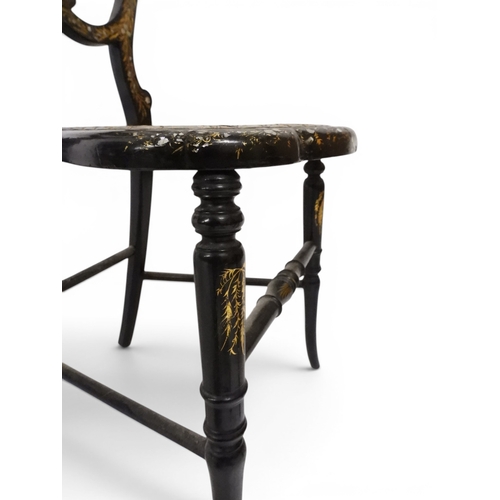 2009 - A 19TH CENTURY BLACK LACQUERED PAPIER MACHE BERGERE PARLOUR CHAIRwith moulded gilt painted mother of... 