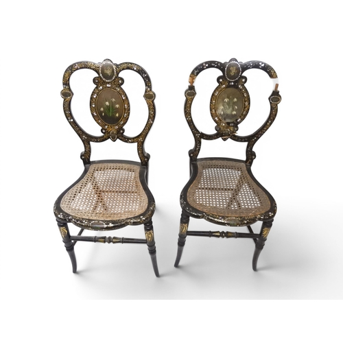 2009 - A 19TH CENTURY BLACK LACQUERED PAPIER MACHE BERGERE PARLOUR CHAIRwith moulded gilt painted mother of... 