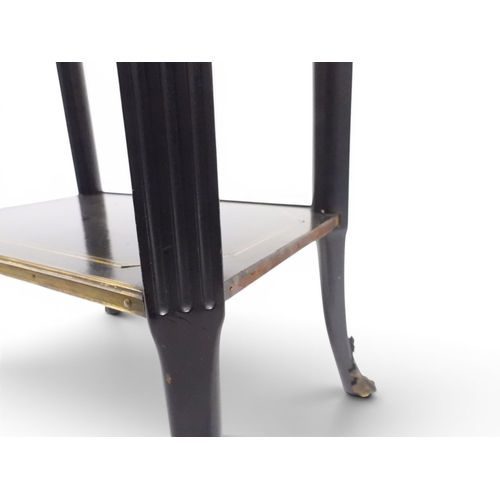 2010 - AN EARLY 20TH CENTURY AESTHETIC STYLE TWO TIER EBONISED OCCASIONAL TABLE&nbsp;rectangular chamfered ... 