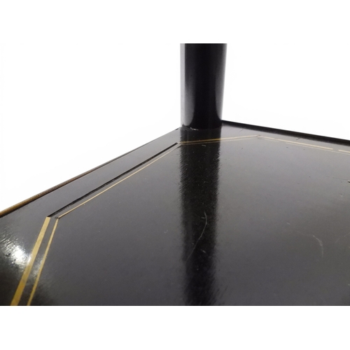 2010 - AN EARLY 20TH CENTURY AESTHETIC STYLE TWO TIER EBONISED OCCASIONAL TABLE&nbsp;rectangular chamfered ... 
