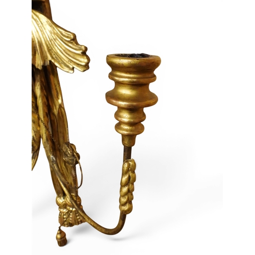 2012 - A PAIR OF REGENCY STYLE TWO BRANCH GILT CANDLE WALL SCONCES with twinned scrolled candle holders und... 
