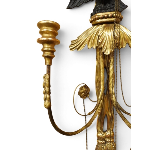 2012 - A PAIR OF REGENCY STYLE TWO BRANCH GILT CANDLE WALL SCONCES with twinned scrolled candle holders und... 