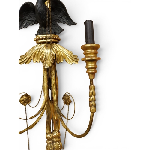 2012 - A PAIR OF REGENCY STYLE TWO BRANCH GILT CANDLE WALL SCONCES with twinned scrolled candle holders und... 