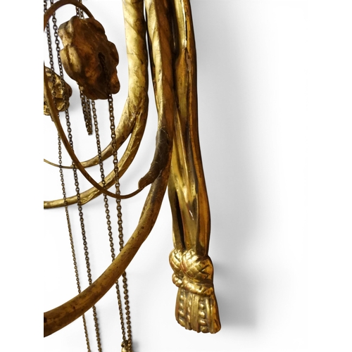 2012 - A PAIR OF REGENCY STYLE TWO BRANCH GILT CANDLE WALL SCONCES with twinned scrolled candle holders und... 