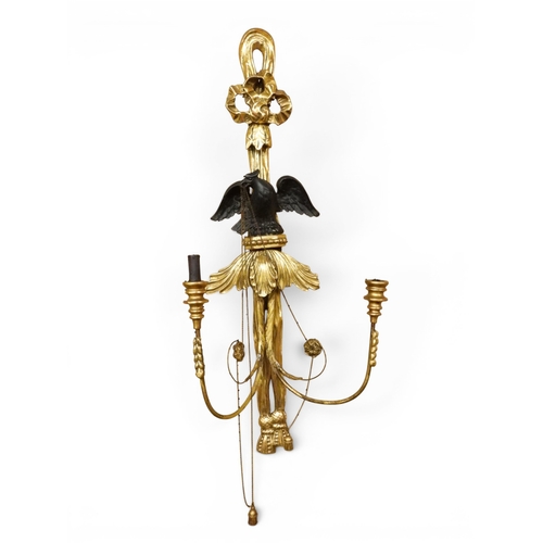 2012 - A PAIR OF REGENCY STYLE TWO BRANCH GILT CANDLE WALL SCONCES with twinned scrolled candle holders und... 