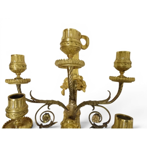 2014 - A PAIR OF 20TH CENTURY GILT METAL REGENCY STYLE FIVE BRANCH CANDLE WALL SCONCESwith scrolled floral ... 
