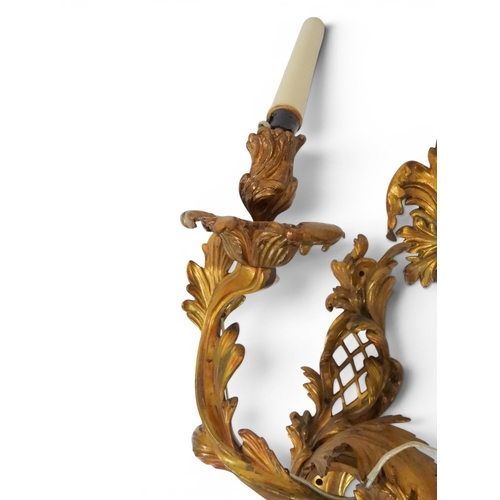 2014 - A PAIR OF 20TH CENTURY GILT METAL REGENCY STYLE FIVE BRANCH CANDLE WALL SCONCESwith scrolled floral ... 