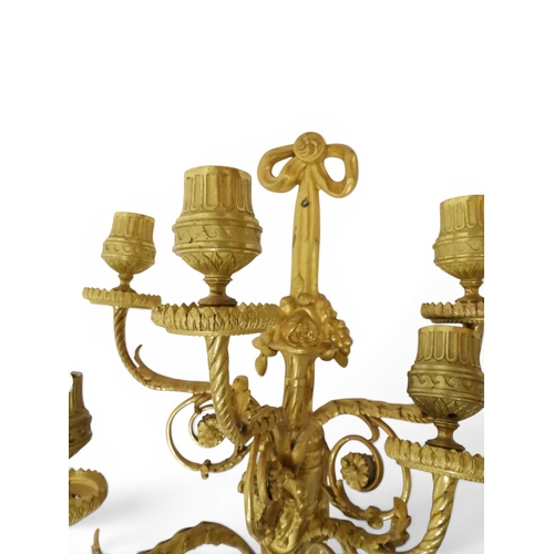2014 - A PAIR OF 20TH CENTURY GILT METAL REGENCY STYLE FIVE BRANCH CANDLE WALL SCONCESwith scrolled floral ... 