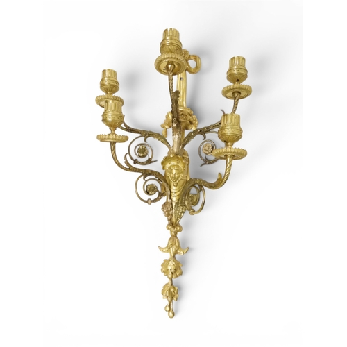 2014 - A PAIR OF 20TH CENTURY GILT METAL REGENCY STYLE FIVE BRANCH CANDLE WALL SCONCESwith scrolled floral ... 