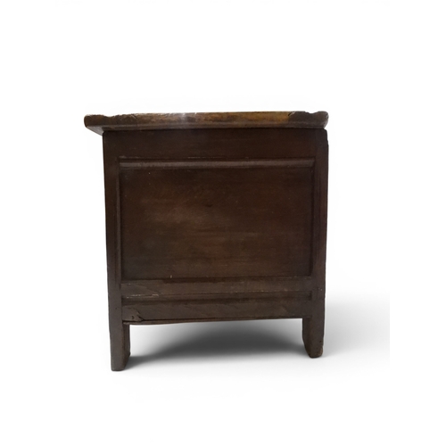 2022 - A 17TH/18TH CENTURY OAK BLANKET CHESTwith three panel lid with wrought iron fitting over carved thre... 