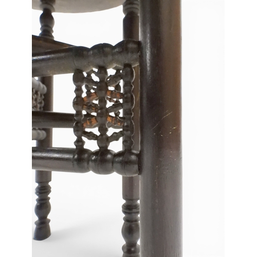 2023 - A 19TH/20TH CENTURY MOORISH COPPER TRAY TOP FOLDING TABLEcircular copper top with raised gallery edg... 