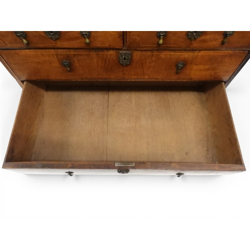2024 - A 17TH CENTURY WILLIAM AND MARY WALNUT VENEERED CHEST OF DRAWERSwith satinwood inlaid top over two s... 