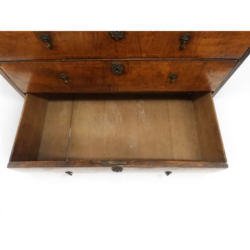 2024 - A 17TH CENTURY WILLIAM AND MARY WALNUT VENEERED CHEST OF DRAWERSwith satinwood inlaid top over two s... 
