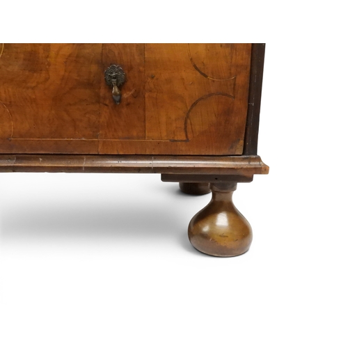 2024 - A 17TH CENTURY WILLIAM AND MARY WALNUT VENEERED CHEST OF DRAWERSwith satinwood inlaid top over two s... 