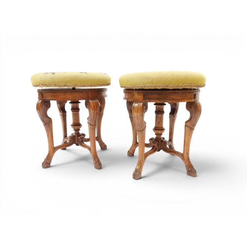 2027 - A PAIR OF 19TH CENTURY WALNUT RISE AND FALL PIANO STOOLS&nbsp;with circular mustard floral tapestry ... 