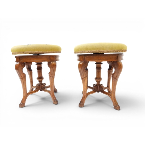 2027 - A PAIR OF 19TH CENTURY WALNUT RISE AND FALL PIANO STOOLS&nbsp;with circular mustard floral tapestry ... 