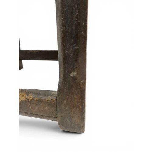 2030 - A 18TH CENTURY OAK WAINSCOT STYLE OAK ARMCHAIR&nbsp;with panel back carved with foliate motifs over ... 