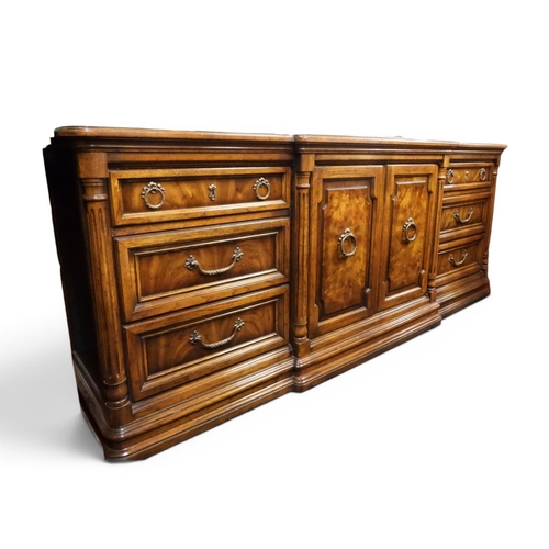17 - A lot comprising a 20th century American pecan wood Drexel Heritage breakfront sideboard with pair o...