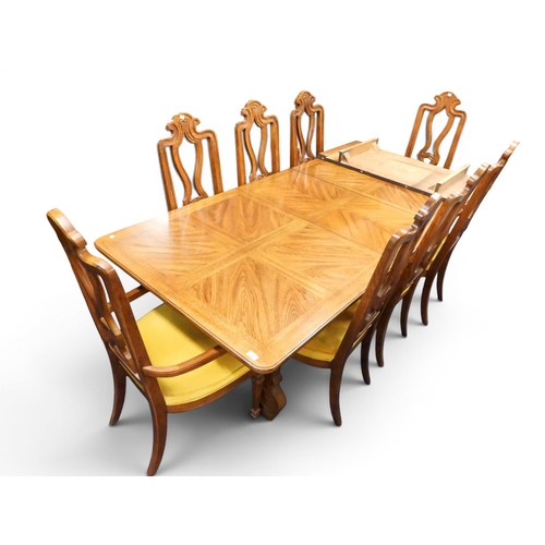 18 - A large 20th century American pecan wood Drexel Heritage dining table and chairs, extending dining t...