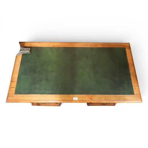 20 - A late 19th pitch pine pedestal desk with green skiver top over long central frieze drawer flanked b...