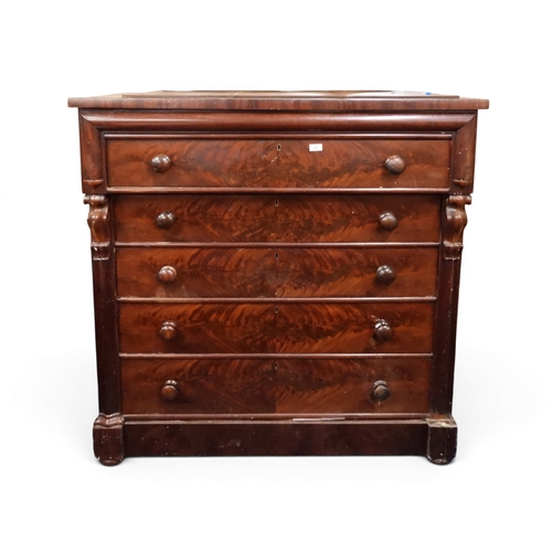 23 - A large 19th century Kilmarnock style bedroom chest with five long graduating drawers over concealed...