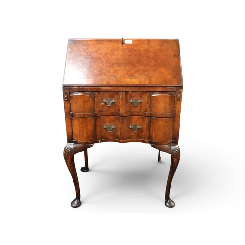 30 - A 19th century walnut and birds eye maple veneered ladies writing bureau with fitted writing compart...