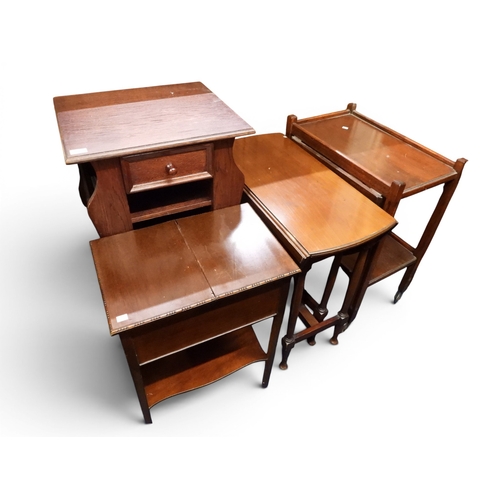 37 - A lot comprising an oak two tier serving trolley, mahogany drop leaf table, nest of three tables, oa...