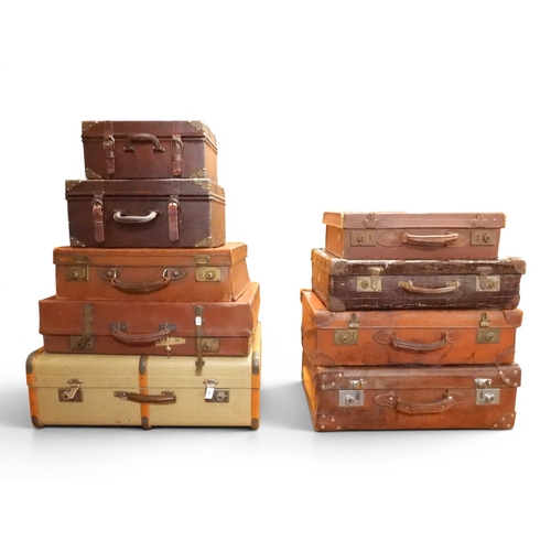 43 - A lot of nine assorted 20th century and earlier travel trunks/cases with wood bound and leather exam...