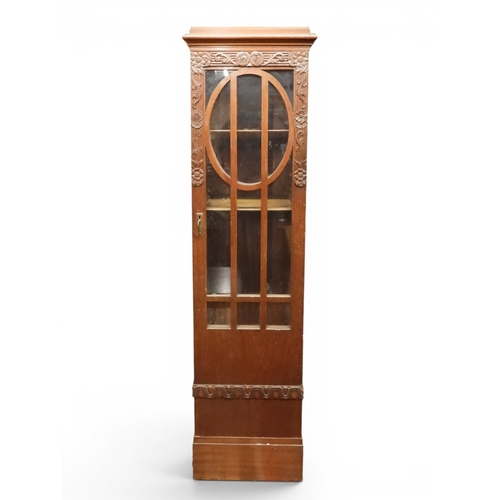 56 - A 19th century oak single door glazed display cabinet, 169cm high x 45cm wide x 40cm deep...