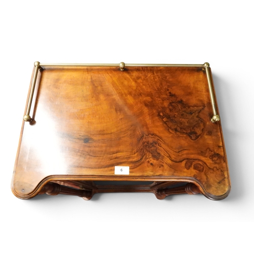 6 - A Victorian mahogany and burr walnut veneered music cabinet with brass galleried top over single gla...