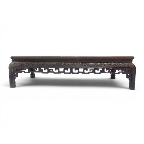 2005 - A LATE 19TH CENTURY CHINESE ROSEWOOD FRAMED OPIUM/COFFEE TABLE with rectangular marble inset top ove... 